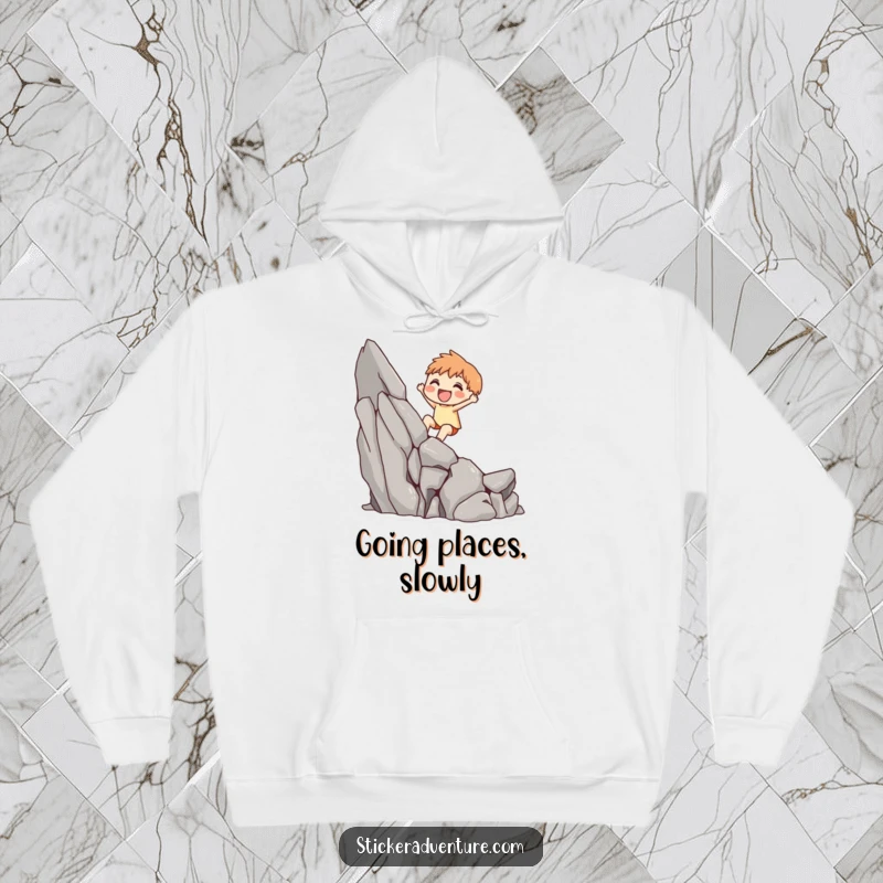 Funny hoodie with a cute character gleefully scaling a small rocky cliff, inspiring courage and a sense of accomplishment.